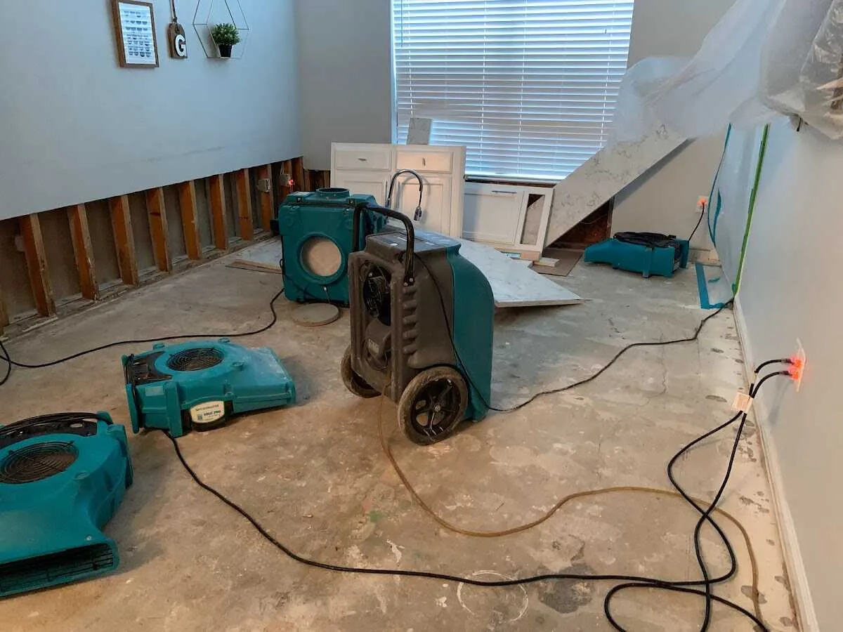 Dehumidifier in flood-cut room for Water Damage Restoration in Oyster Bay